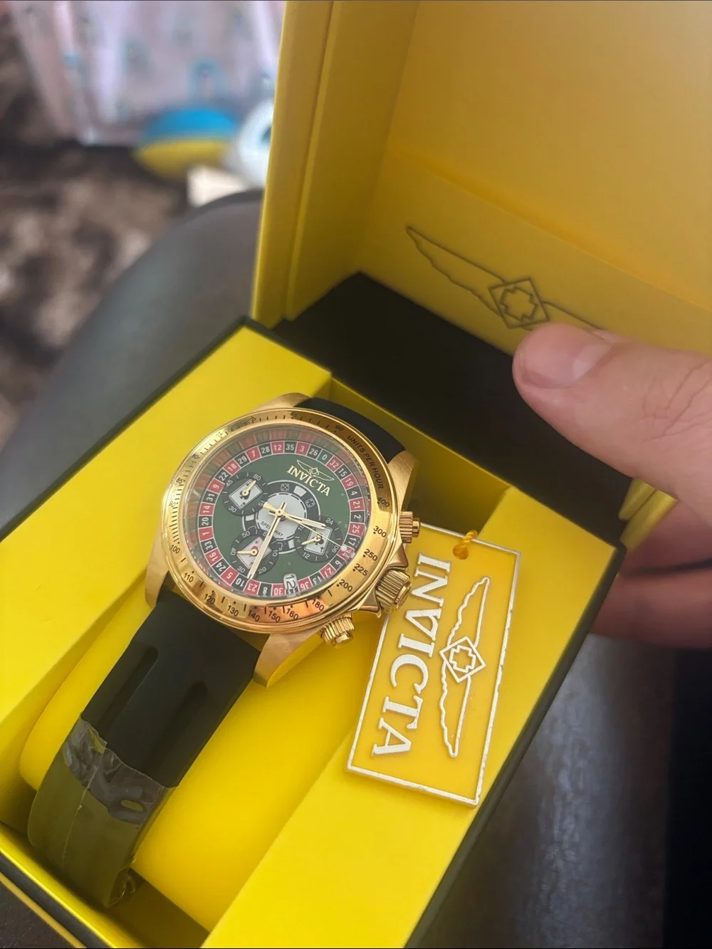 Invicta Gold-Tone Watch with Green Roulette Dial and Black Strap